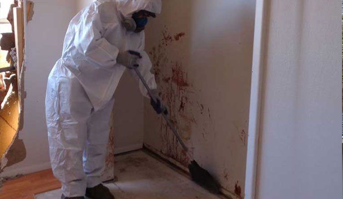 white uniform man clean up biohazard cleanup